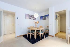 a dining room with a table and chairs at RASTRO in Madrid