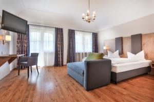 Postel nebo postele na pokoji v ubytování Hotel Schiffmeister