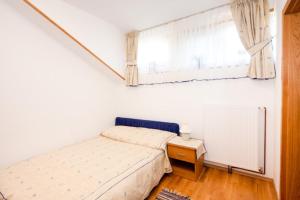 Posteľ alebo postele v izbe v ubytovaní Plitvice Pension Perisic