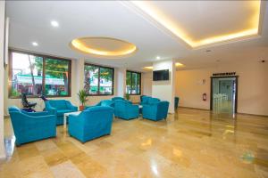 A seating area at Private Hotel