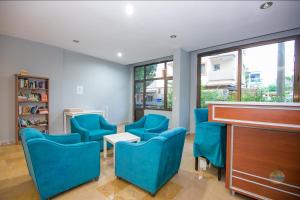A seating area at Private Hotel