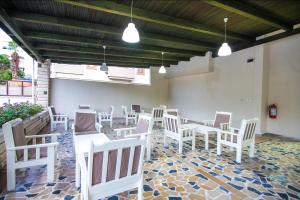 A seating area at Private Hotel