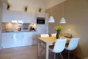 Kuchyň nebo kuchyňský kout v ubytování Apartment Watt´n Glück, Am Alten Deich 26 (Parkplatz 92) + 16 fotografií