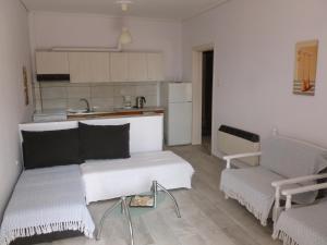 A kitchen or kitchenette at Luca Apartments