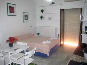 A bed or beds in a room at Estudio Las Huertas