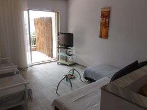 A seating area at Luca Apartments