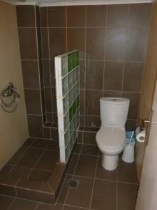 A bathroom at Luca Apartments