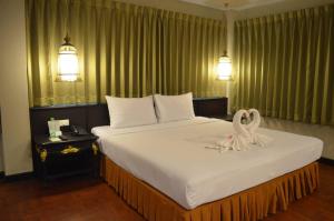 Katil atau katil-katil dalam bilik di Suan Bua Hotel & Resort