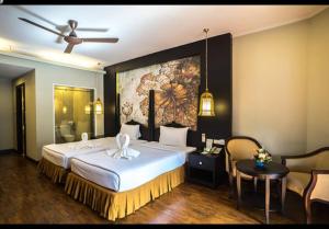Katil atau katil-katil dalam bilik di Suan Bua Hotel & Resort