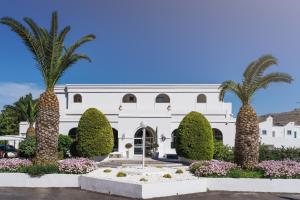 A garden outside Lindos Village Resort & Spa - Adults Only