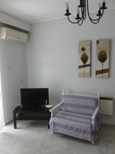 A bed or beds in a room at Luca Apartments