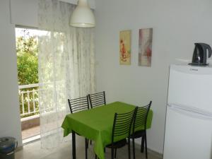 A kitchen or kitchenette at Luca Apartments