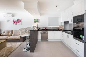 Kuchyň nebo kuchyňský kout v ubytování Apartamentos Mónaco by Garvetur