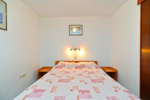 Postel nebo postele na pokoji v ubytování Apartments Fazana 765