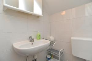 Koupelna v ubytování Apartments Fazana 765