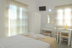 Posteľ alebo postele v izbe v ubytovaní Zeras Apartments