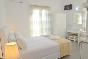 Posteľ alebo postele v izbe v ubytovaní Zeras Apartments