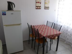 A kitchen or kitchenette at Luca Apartments