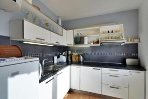 Kuchyň nebo kuchyňský kout v ubytování Apartmán u Kamila