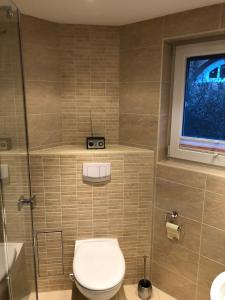 Koupelna v ubytování Ferienhaus Duenenwald 1 _LANG