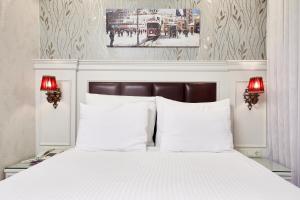 Ein Bett oder Betten in einem Zimmer der Unterkunft Albinas Hotel Old City