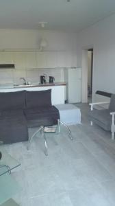 A kitchen or kitchenette at Luca Apartments