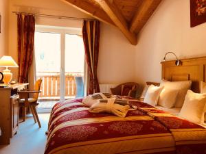 Postel nebo postele na pokoji v ubytování Hotel Berghof