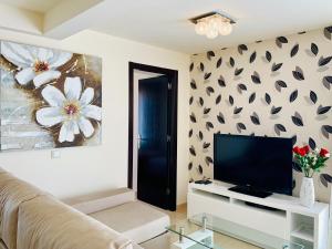 Telewizja i/lub zestaw kina domowego w obiekcie Apartamentos Fuerteventura Sol