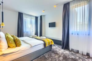 Bel Residence客房内的一张或多张床位