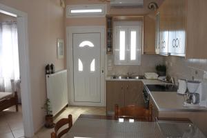 Kjøkken eller kjøkkenkrok på Rampelia Apartments