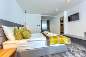 Bel Residence客房内的一张或多张床位