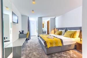 Bel Residence客房内的一张或多张床位