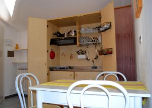 Kuchyň nebo kuchyňský kout v ubytování Residence Castiglione