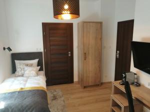 Posteľ alebo postele v izbe v ubytovaní Coffee Inn