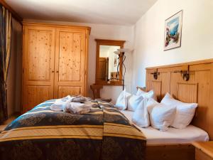 Postel nebo postele na pokoji v ubytování Hotel Berghof
