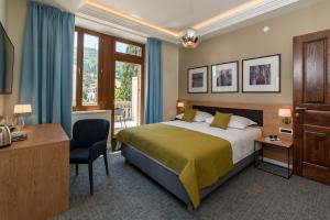 Ein Bett oder Betten in einem Zimmer der Unterkunft Boutique Villa Filaus
