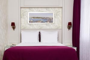 Ein Bett oder Betten in einem Zimmer der Unterkunft Albinas Hotel Old City