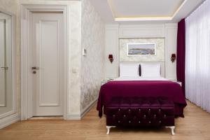 Ein Bett oder Betten in einem Zimmer der Unterkunft Albinas Hotel Old City