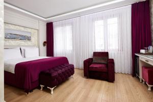 Ein Bett oder Betten in einem Zimmer der Unterkunft Albinas Hotel Old City