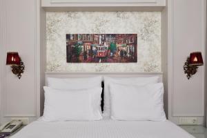 Ein Bett oder Betten in einem Zimmer der Unterkunft Albinas Hotel Old City