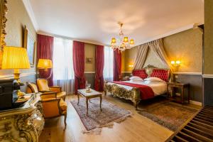 Postel nebo postele na pokoji v ubytování Boutique Hotel Die Swaene