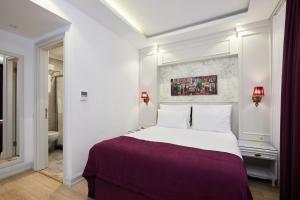 Ein Bett oder Betten in einem Zimmer der Unterkunft Albinas Hotel Old City