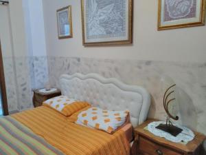 Postel nebo postele na pokoji v ubytování AL BORGO VACANZE B&B
