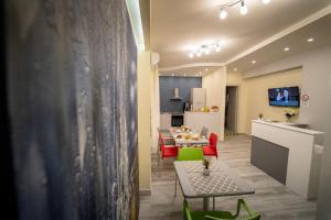 TV a/nebo společenská místnost v ubytování B&B In Centro