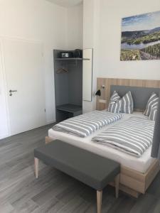 Postel nebo postele na pokoji v ubytování Hotel Lumi