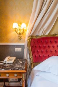 Postel nebo postele na pokoji v ubytování Boutique Hotel Die Swaene