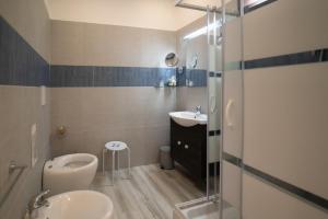 Koupelna v ubytování B&B In Centro + 37 fotografií