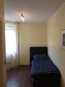 Postel nebo postele na pokoji v ubytování Apartment Leon