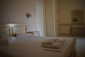 Posteľ alebo postele v izbe v ubytovaní Anesis Village Studios and Apartments