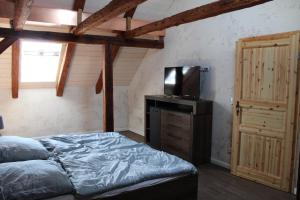 Postel nebo postele na pokoji v ubytování Ferienwohnung auf dem Bauernhof